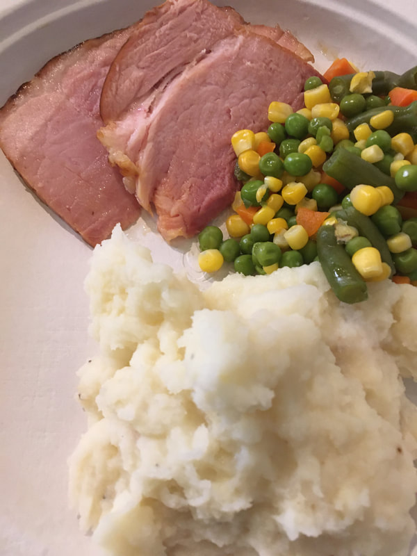 Starting from the left; ham, corn & peas, mashed potatoes